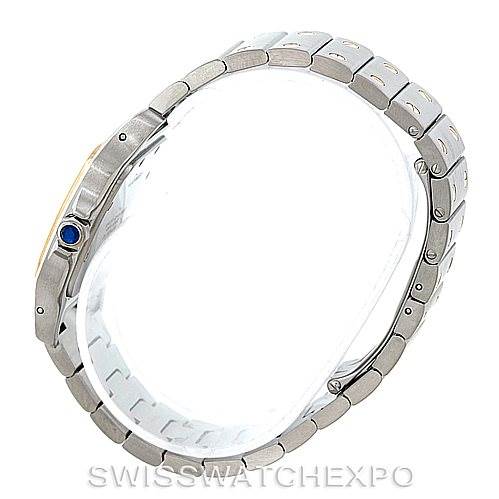 This side view of a Cartier Santos W20011C4 Men
s Stainless Steel Silver Dial W20011C4 Men
s Stainless Steel Silver Dial watch shows its metal bracelet, case, and crown with a blue cabochon.