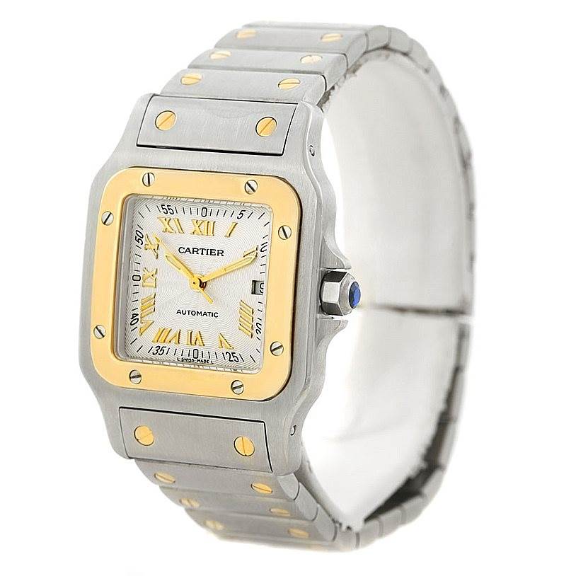 This Cartier Santos W20058C4 Men
s Stainless Steel Silver Dial W20058C4 Men
s Stainless Steel Silver Dial watch is shown at a three-quarter angle emphasizing its square face, bezel, and metal bracelet.