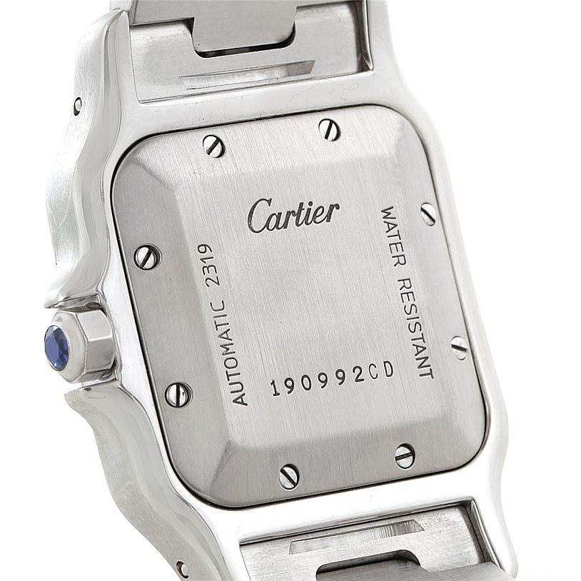 This image shows the back case and part of the bracelet of the Santos model by Cartier.