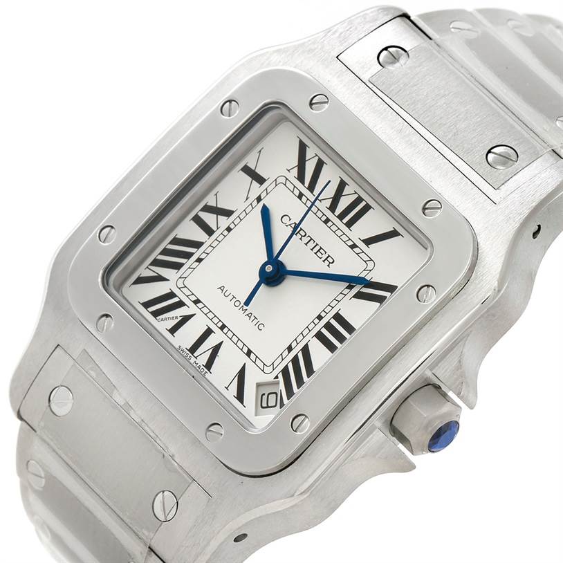 This image shows a close-up angle of the Cartier Santos W20098D6 Men
s Stainless Steel Silver Dial W20098D6 Men
s Stainless Steel Silver Dial watch focusing on the face, bezel, crown, and part of the bracelet.