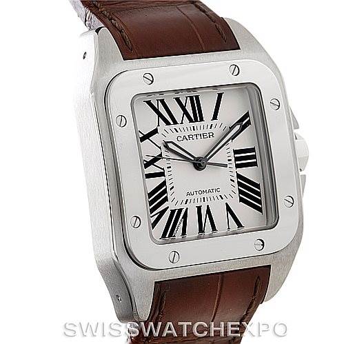This image shows a Cartier Santos W20073X8 Men
s Stainless Steel Silver Dial W20073X8 Men
s Stainless Steel Silver Dial watch from a three-quarter angle, highlighting the rectangular case, dial, and part of the leather strap.