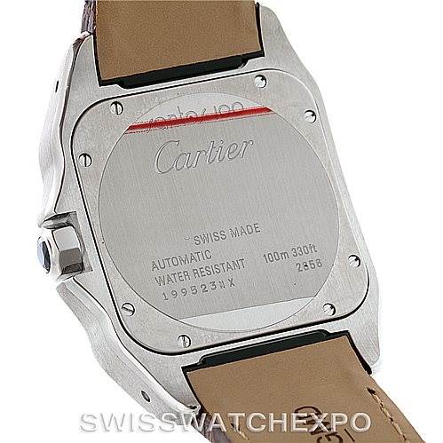 This image shows the back case of a Santos model watch by Cartier, highlighting the brand
s engravings and leather strap.