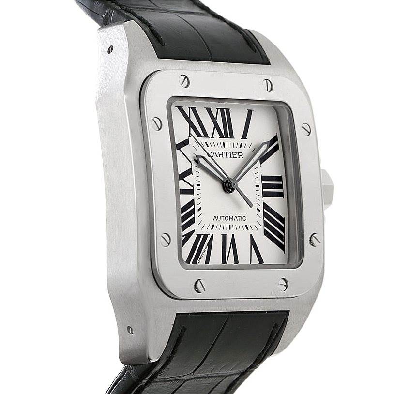The Cartier Santos W20073X8 Men
s Stainless Steel Silver Dial W20073X8 Men
s Stainless Steel Silver Dial watch is shown here at a side angle, displaying the face, case, crown, and part of the black leather strap.