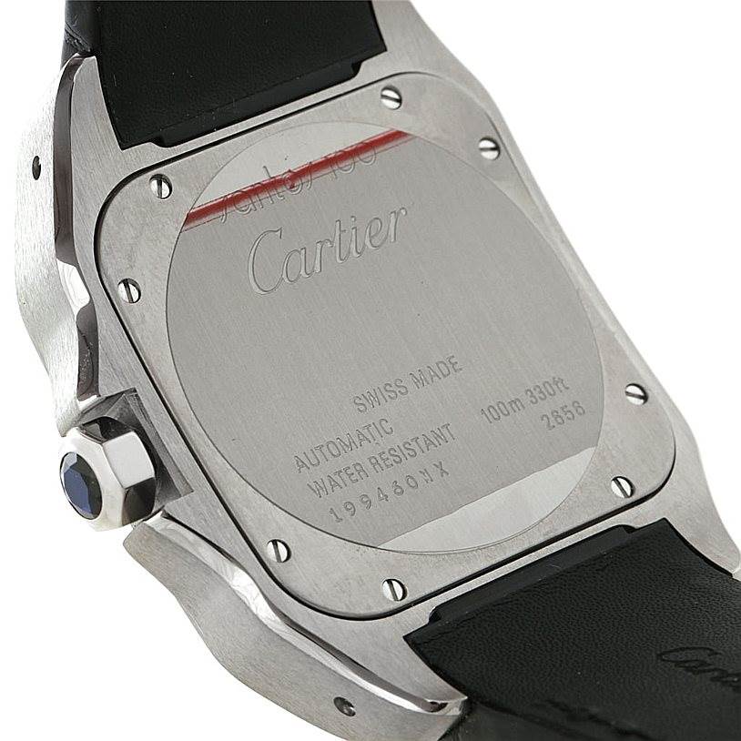 The image shows the case back of the Cartier Santos W20073X8 Men
s Stainless Steel Silver Dial W20073X8 Men
s Stainless Steel Silver Dial model watch, highlighting the engravings and the leather strap attachment.