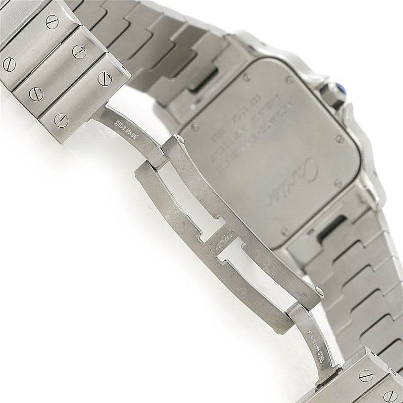 The image shows the back case and clasp of a Santos model by Cartier.