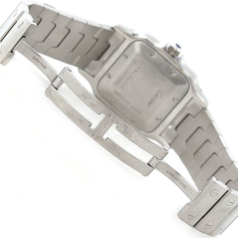 The image shows the back and clasp of a Cartier Santos W20055D6 Men's Stainless Steel Silver Dial W20055D6 Men's Stainless Steel Silver Dial watch, highlighting the stainless steel bracelet and deployment clasp.