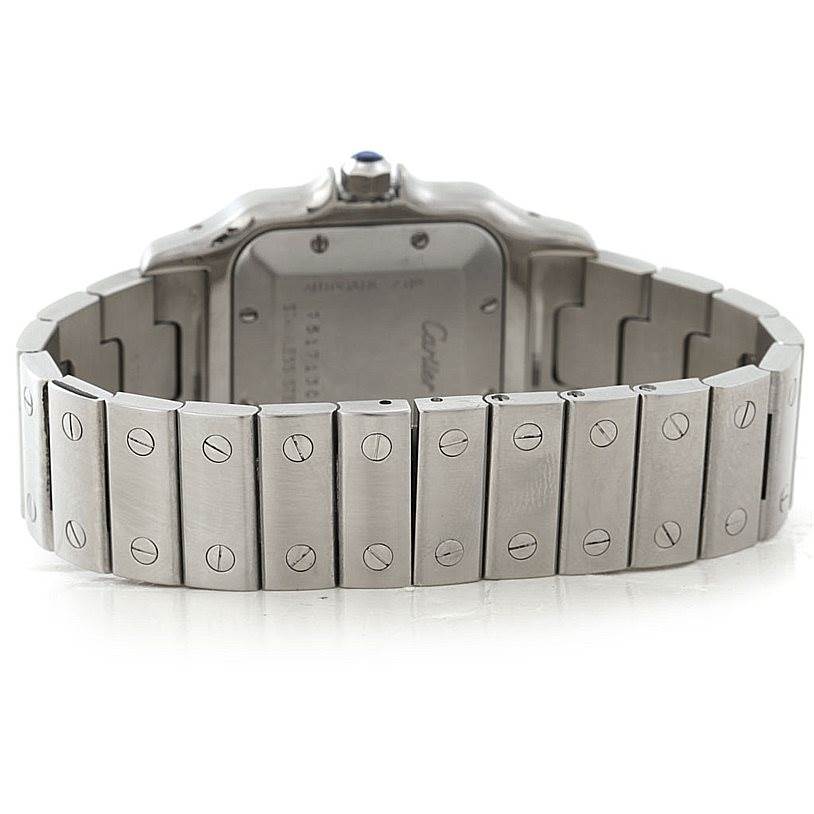 The image shows the backside of the Cartier Santos W20055D6 Men's Stainless Steel Silver Dial W20055D6 Men's Stainless Steel Silver Dial watch, focusing on the stainless steel bracelet and case back.