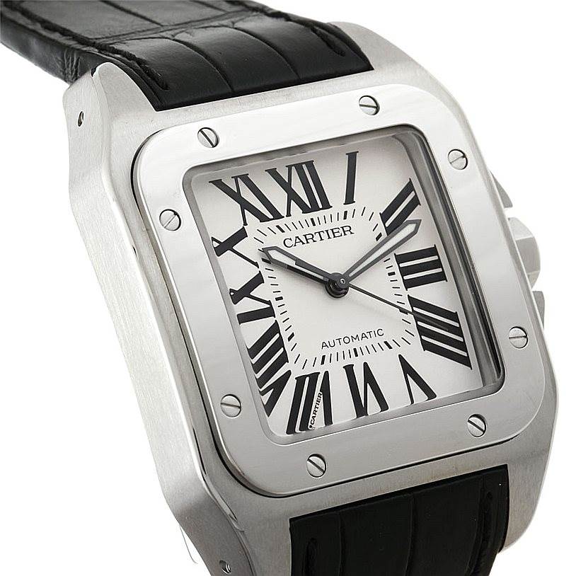 This image shows a close-up, angled view of the Cartier Santos W20073X8 Men
s Stainless Steel Silver Dial W20073X8 Men
s Stainless Steel Silver Dial watch, highlighting its face, dial, case, and leather strap.