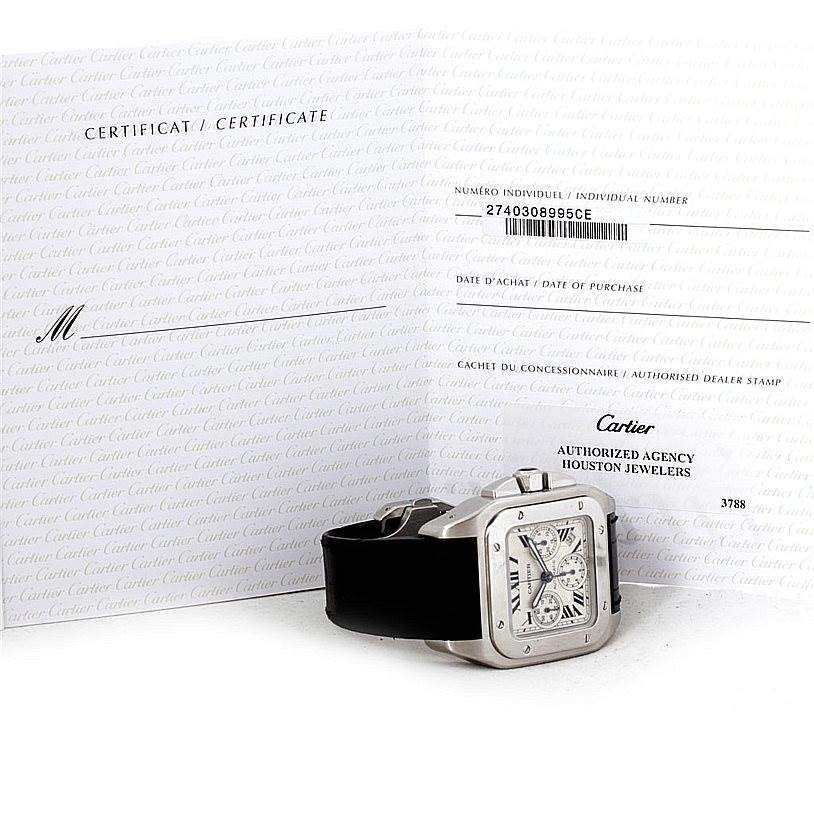 This image shows a Santos de Cartier watch at an angle, along with its certificate and documentation.