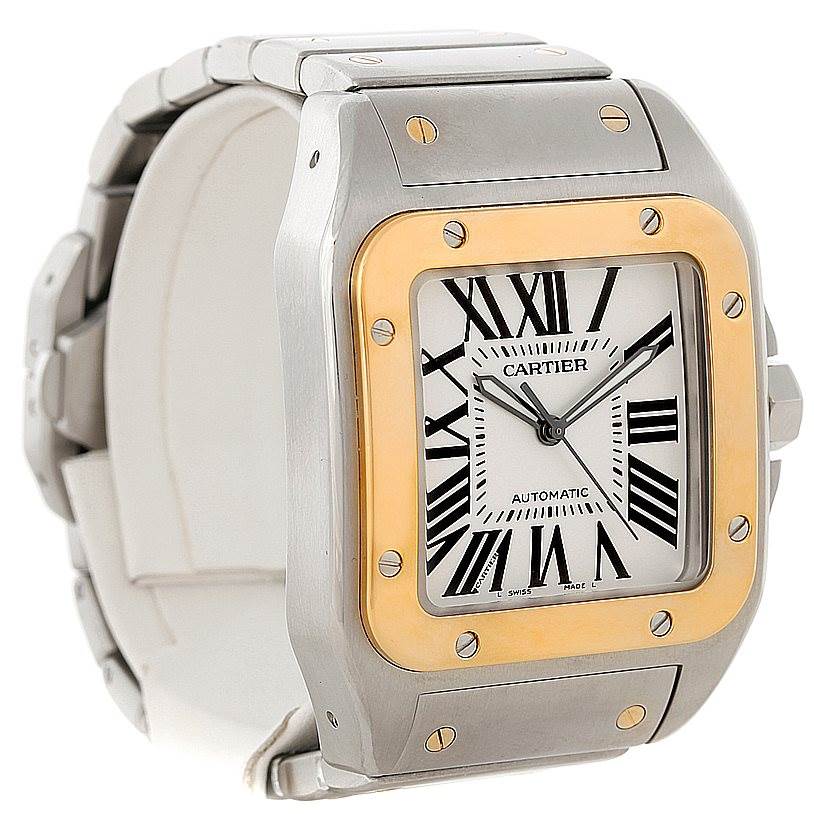 This is a close-up view of the Cartier Santos W200728G Men
s Stainless Steel Silver Dial W200728G Men
s Stainless Steel Silver Dial watch, displaying the face, bezel, and part of the metal bracelet.