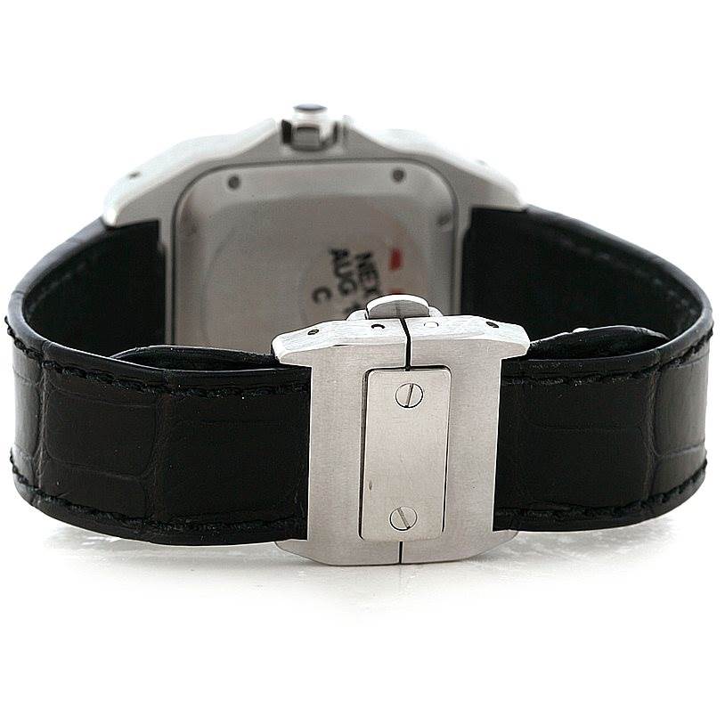 The image shows the back of a Cartier Santos W20106X8 Men
s Stainless Steel Silver Dial W20106X8 Men
s Stainless Steel Silver Dial watch, highlighting the clasp and black leather strap.