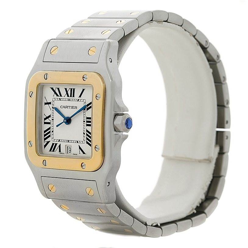 The image shows a side angle of the Cartier Santos W20011C4 Men
s Stainless Steel Silver Dial W20011C4 Men
s Stainless Steel Silver Dial watch, highlighting its face, bezel, and bracelet.