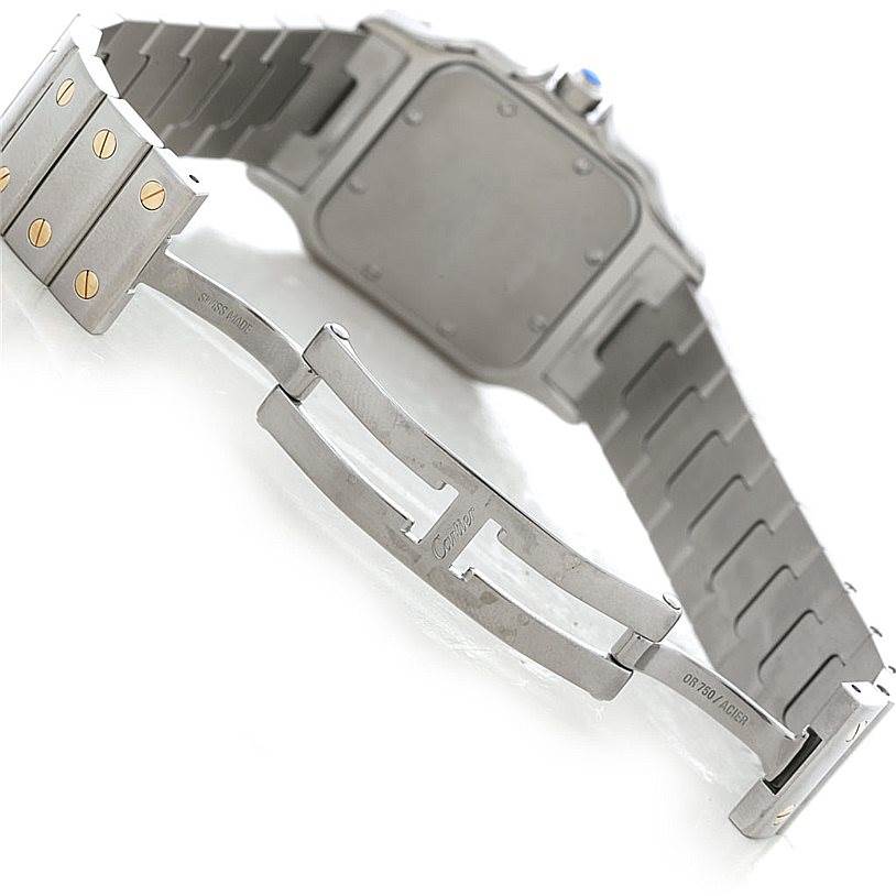 The image shows the back of a Cartier Santos W20011C4 Men
s Stainless Steel Silver Dial W20011C4 Men
s Stainless Steel Silver Dial watch and its open metal bracelet clasp.