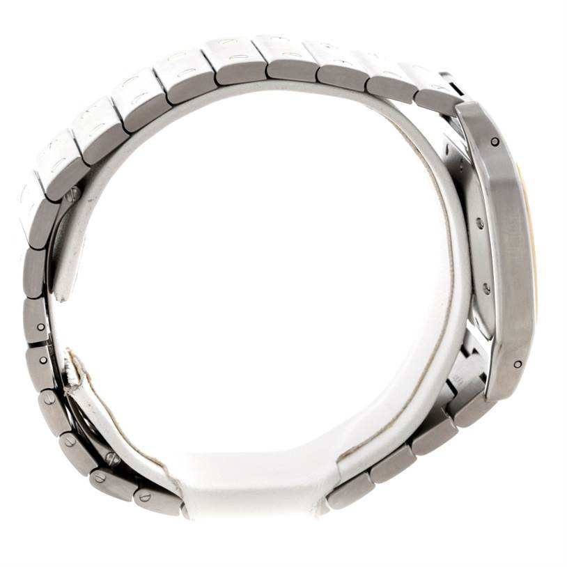 The image shows a side view of a Cartier Santos W20058C4 Men
s Stainless Steel Silver Dial W20058C4 Men
s Stainless Steel Silver Dial watch, highlighting the metal bracelet and case.