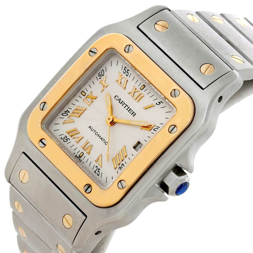 The Cartier Santos W20058C4 Men
s Stainless Steel Silver Dial W20058C4 Men
s Stainless Steel Silver Dial watch is shown at a slight angle featuring its dial, bezel, and portion of the bracelet.