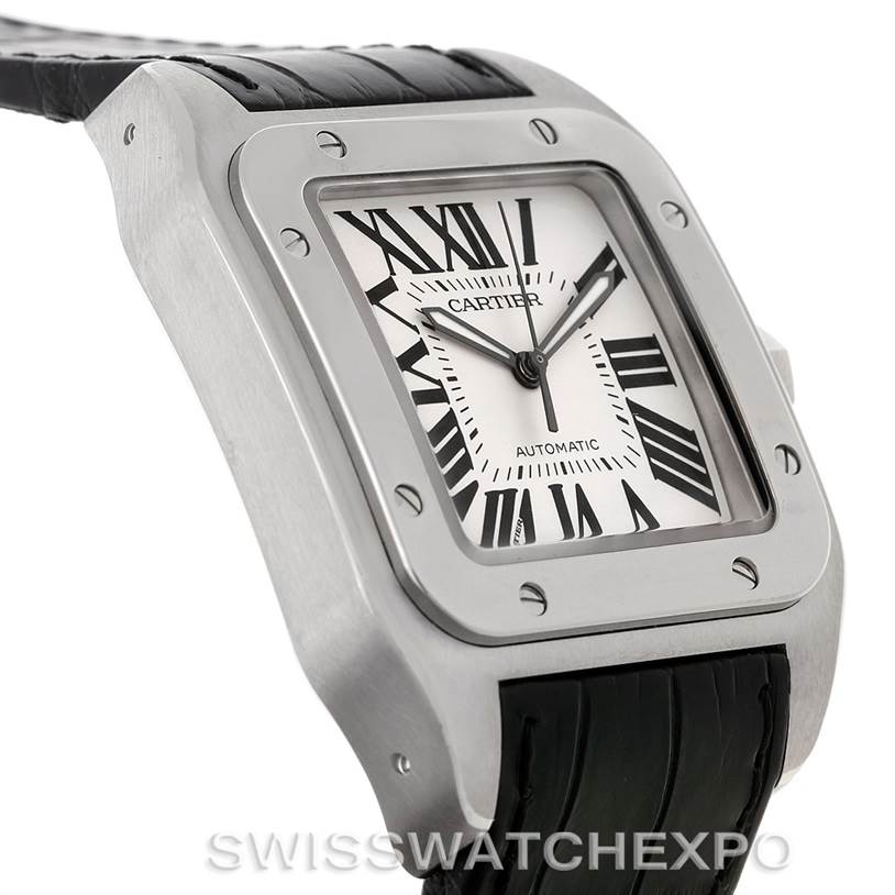 The image shows a close-up side angle of the Cartier Santos W20073X8 Men
s Stainless Steel Silver Dial W20073X8 Men
s Stainless Steel Silver Dial watch face and part of its black leather strap.