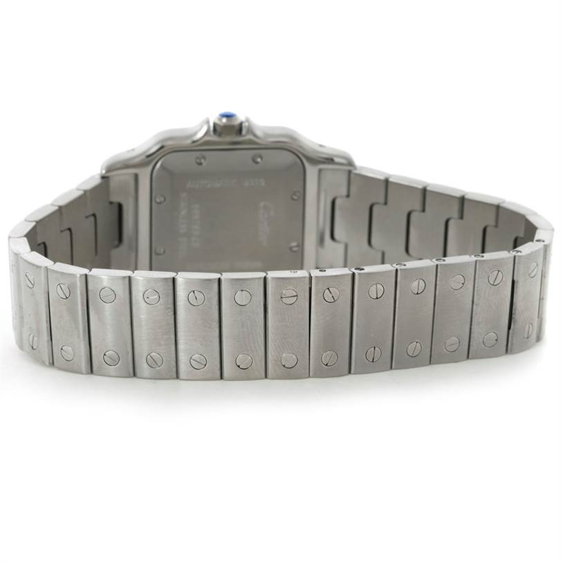 The image shows the back of the Cartier Santos W20055D6 Men
s Stainless Steel Silver Dial W20055D6 Men
s Stainless Steel Silver Dial watch, displaying its case back and metal bracelet.
