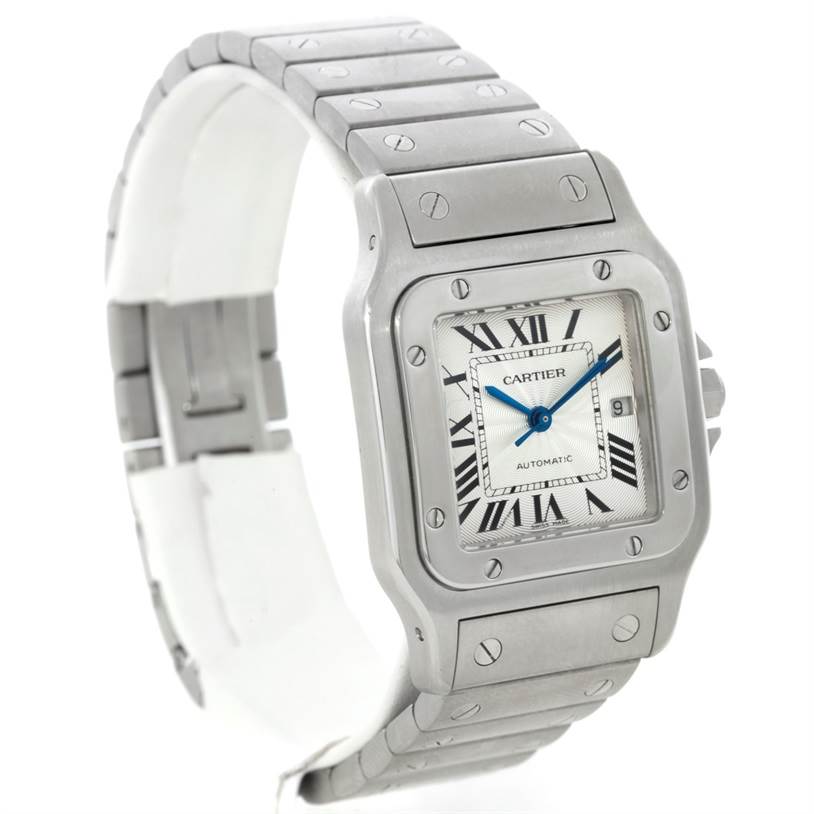 The image shows a Cartier Santos W20055D6 Men
s Stainless Steel Silver Dial W20055D6 Men
s Stainless Steel Silver Dial watch at an angled view, highlighting the square face, Roman numerals, and metal bracelet.