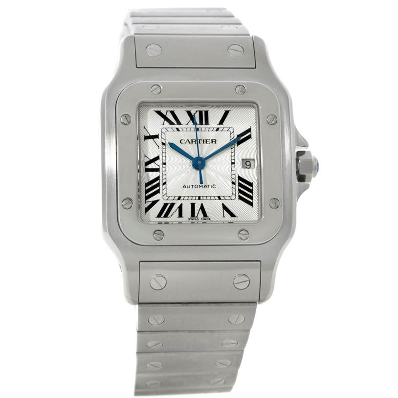 The image shows a close-up view of a Cartier Santos W20055D6 Men
s Stainless Steel Silver Dial W20055D6 Men
s Stainless Steel Silver Dial watch, highlighting its square face, Roman numerals, and metal bracelet.