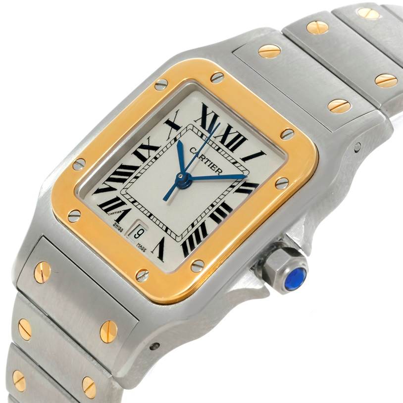 The Cartier Santos W20011C4 Men's Stainless Steel Silver Dial W20011C4 Men's Stainless Steel Silver Dial watch is shown from an angled close-up, highlighting the face, bezel, crown, and part of the bracelet.