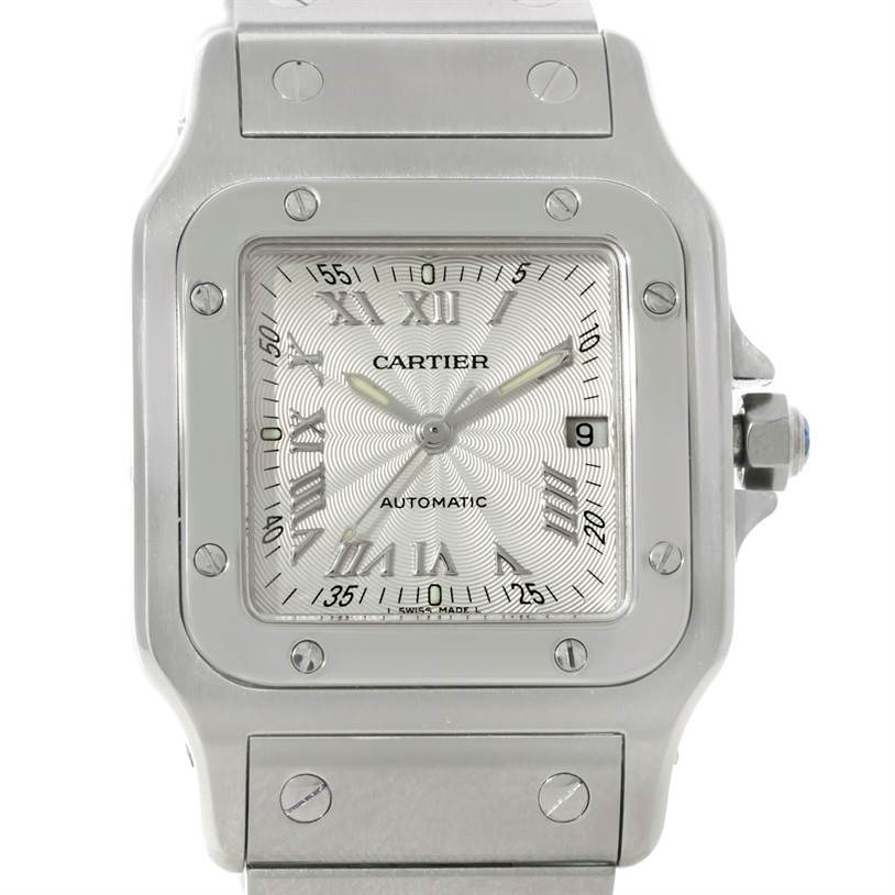 The image shows a front view of a Cartier Santos W20055D6 Men's Stainless Steel Silver Dial W20055D6 Men's Stainless Steel Silver Dial watch, highlighting its face, bezel, and part of the band.