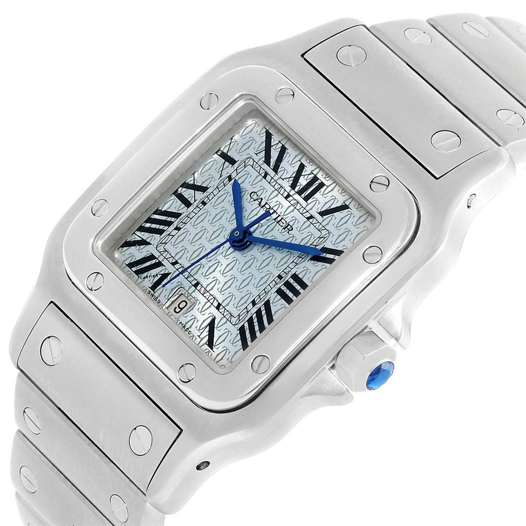This is a Cartier Santos W20065D6 Men
s Stainless Steel Blue Dial W20065D6 Men
s Stainless Steel Blue Dial watch shown from a three-quarter angle, highlighting the dial, bezel, and part of the bracelet.