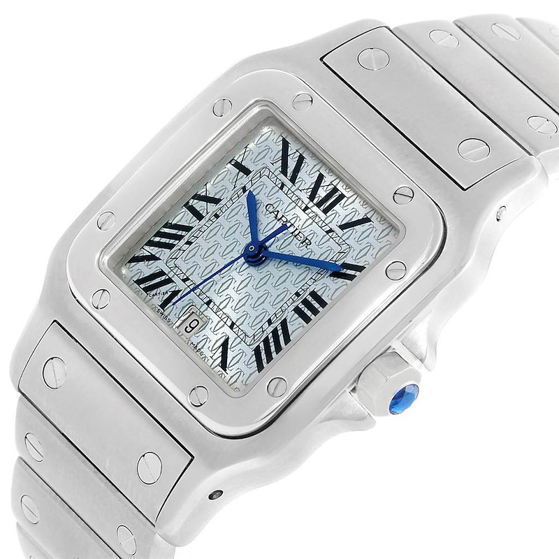 This is a Cartier Santos watch shown from a three-quarter angle, highlighting the dial, bezel, and part of the bracelet.