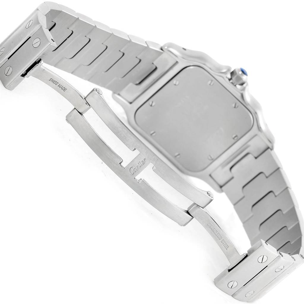 The image shows the back view of a Santos watch by Cartier, highlighting the stainless steel band and clasp.