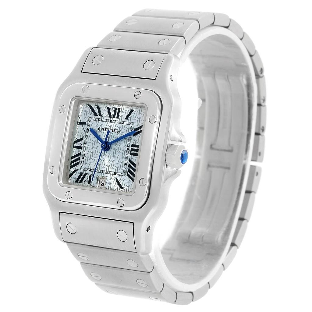 The image shows a Cartier Santos W20065D6 Men
s Stainless Steel Blue Dial W20065D6 Men
s Stainless Steel Blue Dial watch at a 3/4 angle, displaying the face, bezel, and metal bracelet.