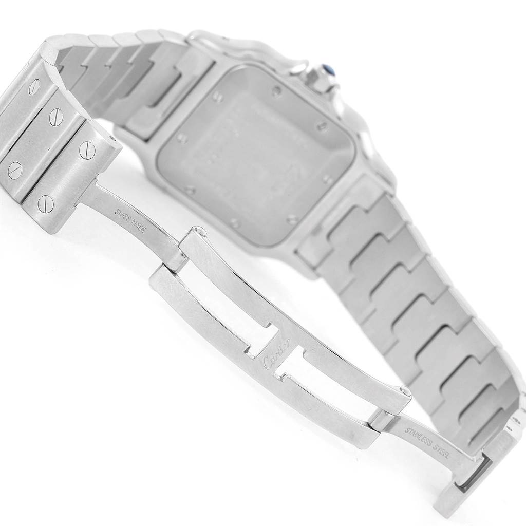 The image shows the back view and bracelet clasp of a Santos model watch by Cartier.