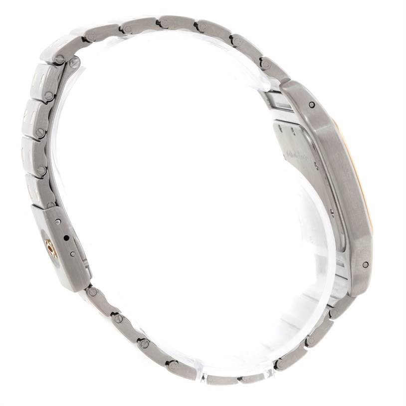 This image shows a side view of the Santos model by Cartier, focusing on the watch case and metal bracelet.