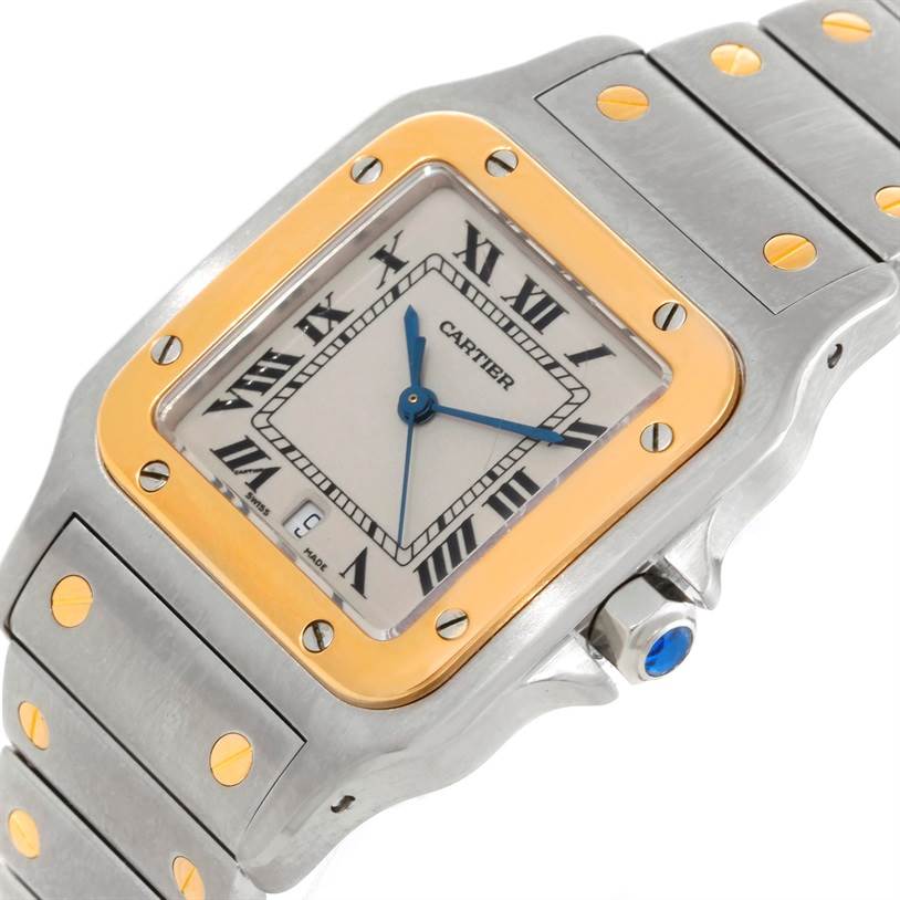 The image shows a close-up angle of a Cartier Santos Stainless Steel Silver Dial Stainless Steel Silver Dial watch, highlighting its face, bezel, crown, and bracelet.