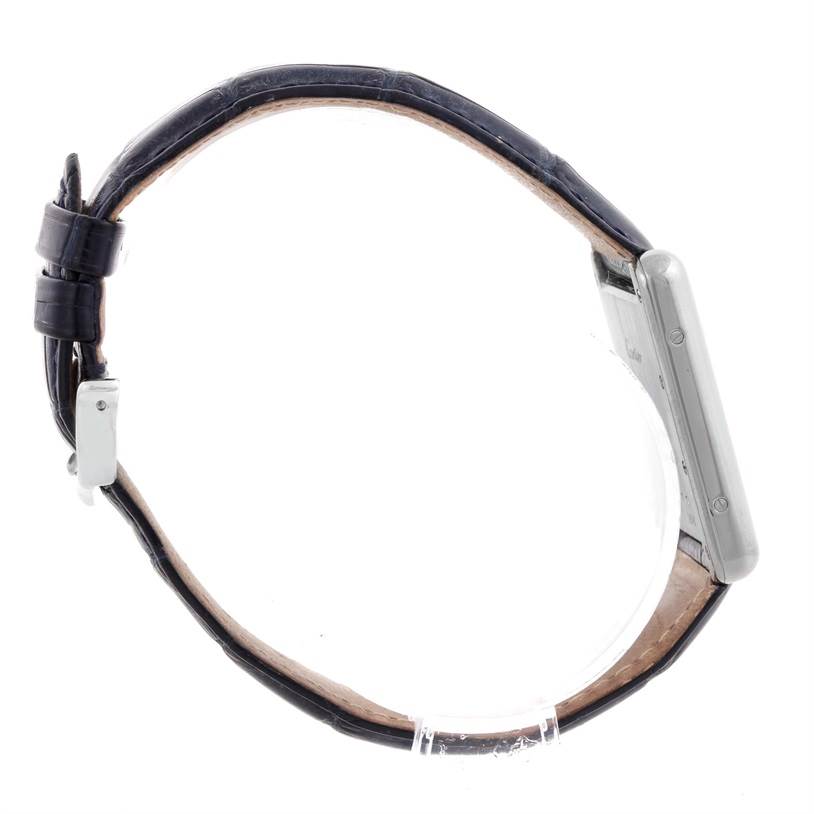 The image shows a Cartier Tank Louis W1540956 Men
s White Gold White Dial W1540956 Men
s White Gold White Dial watch from a side profile, highlighting the strap, buckle, and case edge.