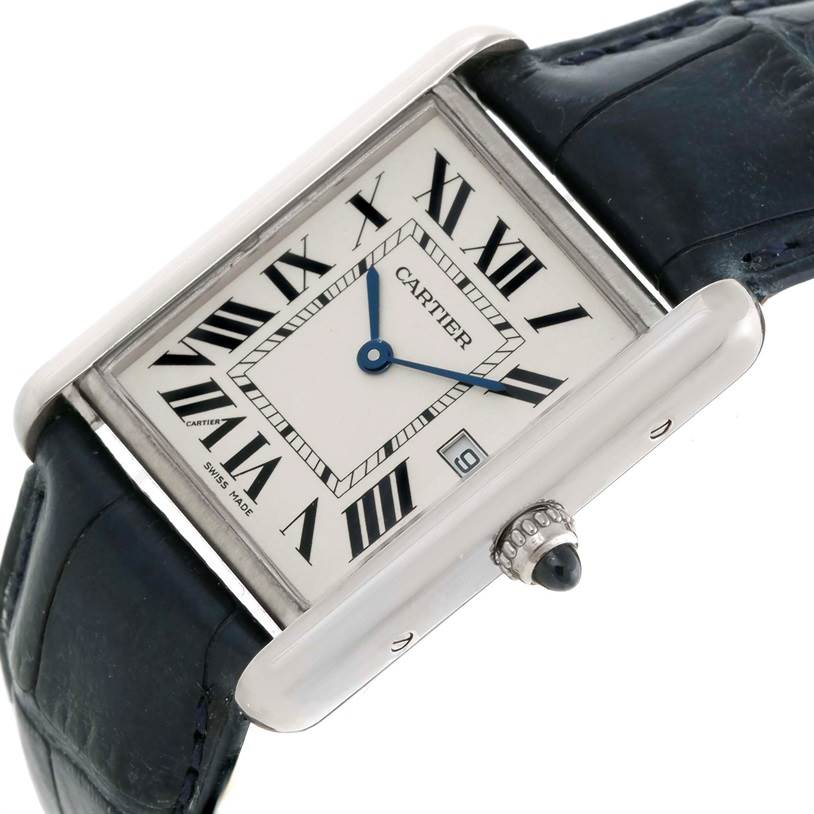 This image features a Tank Louis model by Cartier, showing its face, crown, and part of the leather strap.