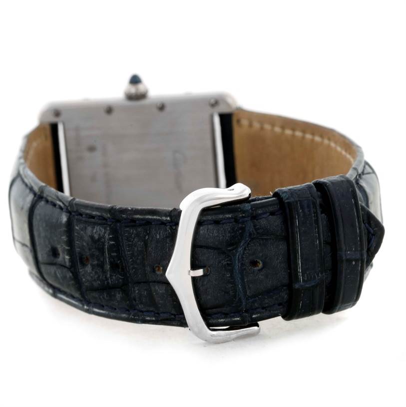 This image shows the back view of a Cartier Tank Louis W1540956 Men
s White Gold White Dial W1540956 Men
s White Gold White Dial watch, highlighting the strap and clasp.