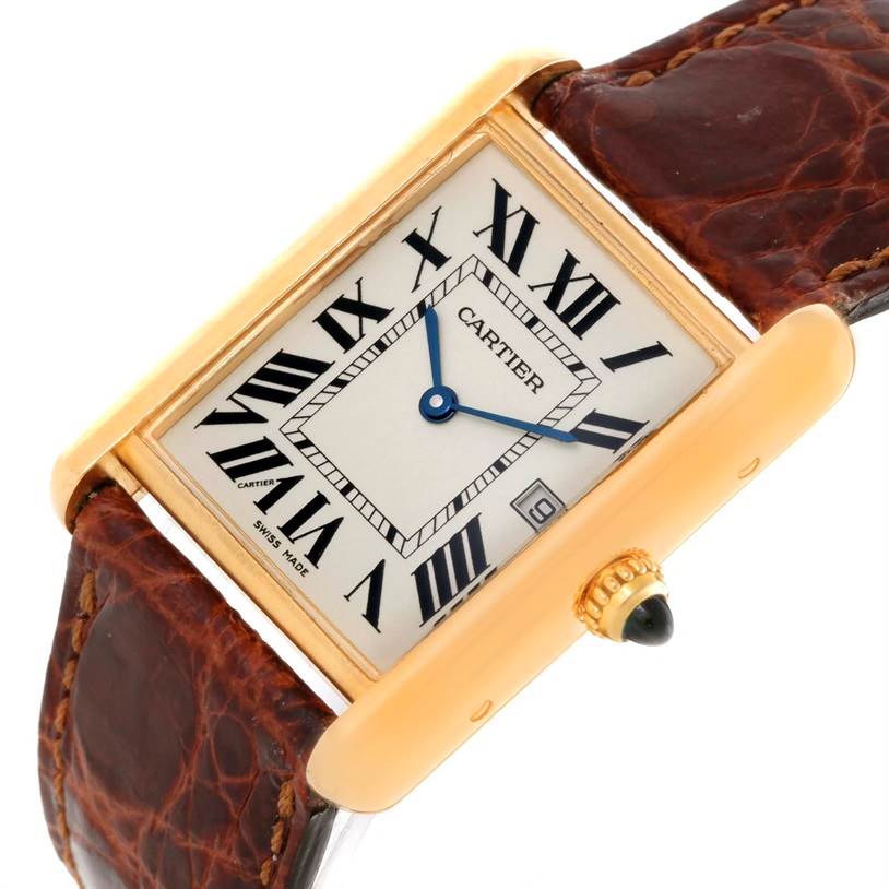 The image shows a Cartier Tank Louis W1529756 Yellow Gold Silver Dial W1529756 Yellow Gold Silver Dial watch at an angled close-up, highlighting the face, casing, crown, and part of the leather strap.