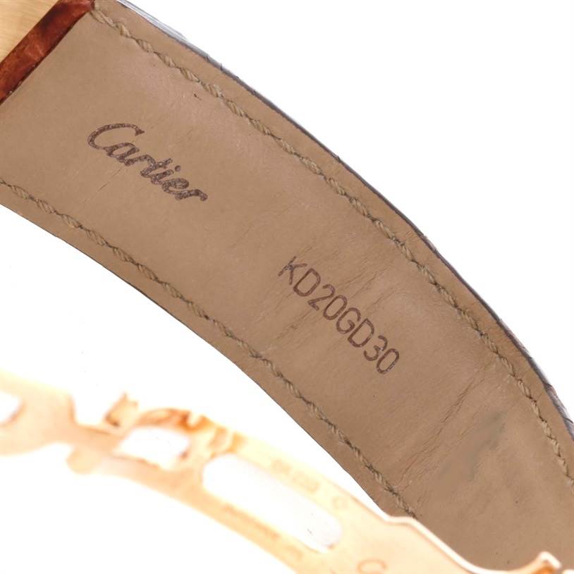 This image shows the inside of the leather strap of a Cartier Tank Louis W1529756 Yellow Gold Silver Dial W1529756 Yellow Gold Silver Dial watch, displaying the brand logo and a serial number.