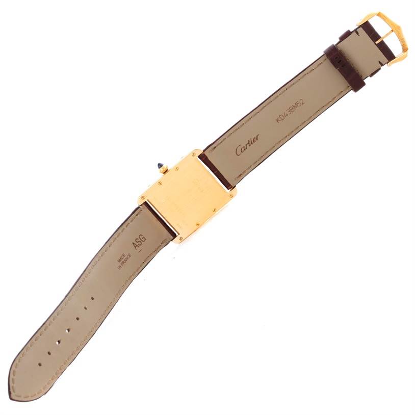 The image shows the back view of a Cartier Tank Louis W1529756 Men's Yellow Gold Silver Dial W1529756 Men's Yellow Gold Silver Dial watch, highlighting the strap, buckle, and case.