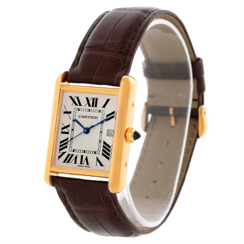 The Tank Louis Cartier watch is shown at a slight angle, highlighting its face, case, strap, and crown.