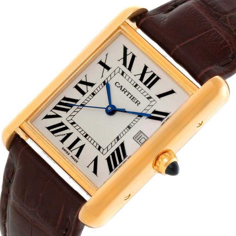 The image shows a close-up of a Cartier Tank Louis W1529756 Men's Yellow Gold Silver Dial W1529756 Men's Yellow Gold Silver Dial watch from a slight angle, capturing its square face, Roman numerals, blue hands, and brown leather strap.