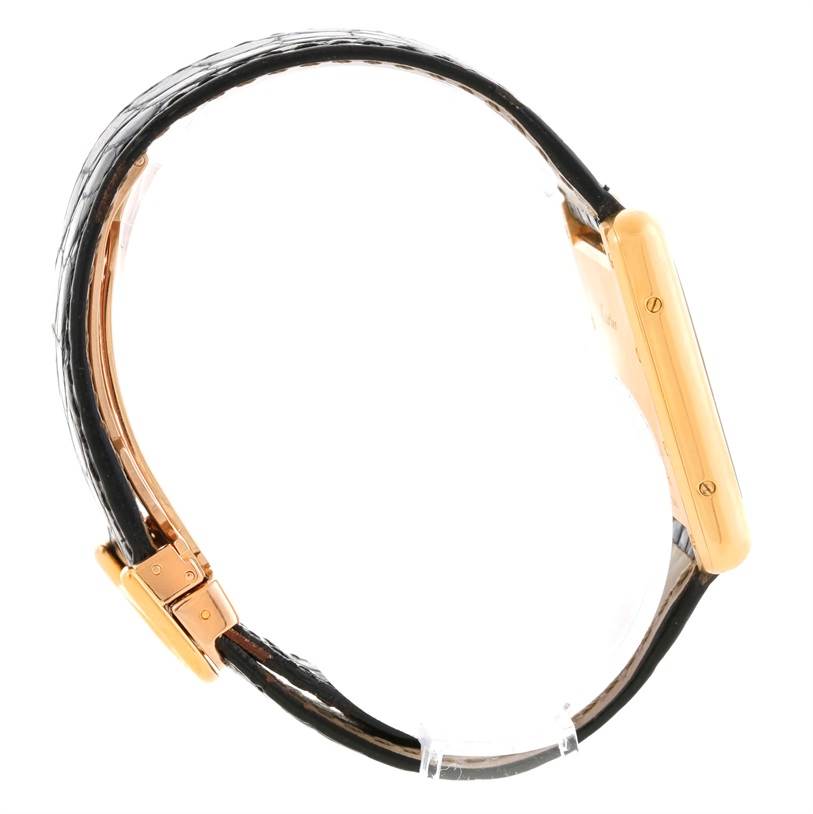 The image shows a Cartier Tank Louis W1529756 Men's Yellow Gold Silver Dial W1529756 Men's Yellow Gold Silver Dial watch from a side angle, highlighting the case and strap.