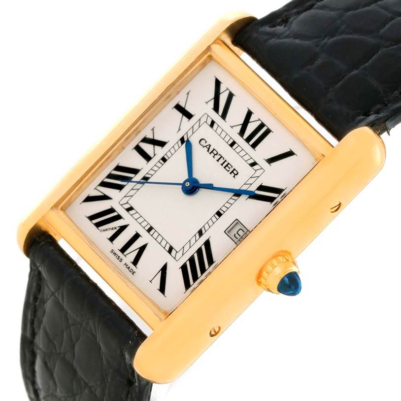This image shows a close-up angle of the Cartier Tank Louis W1529756 Men's Yellow Gold Silver Dial W1529756 Men's Yellow Gold Silver Dial watch, highlighting its rectangular dial, Roman numerals, and blue crown.