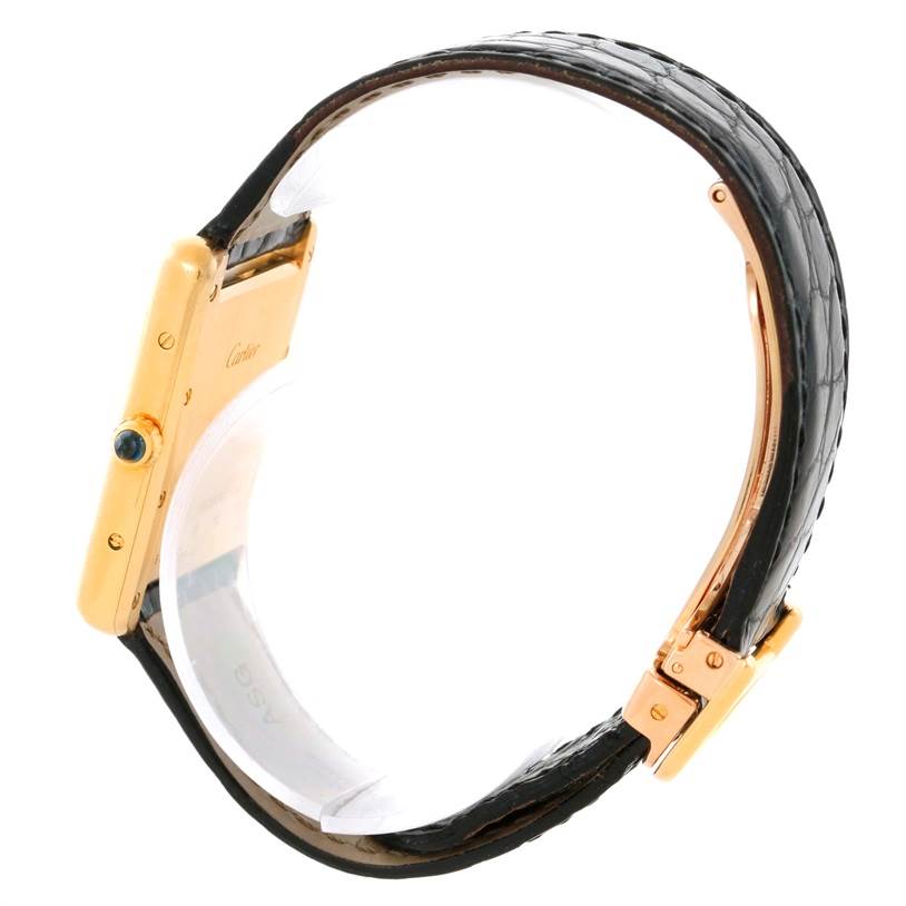 This image shows a side view of the Cartier Tank Louis W1529756 Men's Yellow Gold Silver Dial W1529756 Men's Yellow Gold Silver Dial watch, highlighting the strap, crown, and case side.