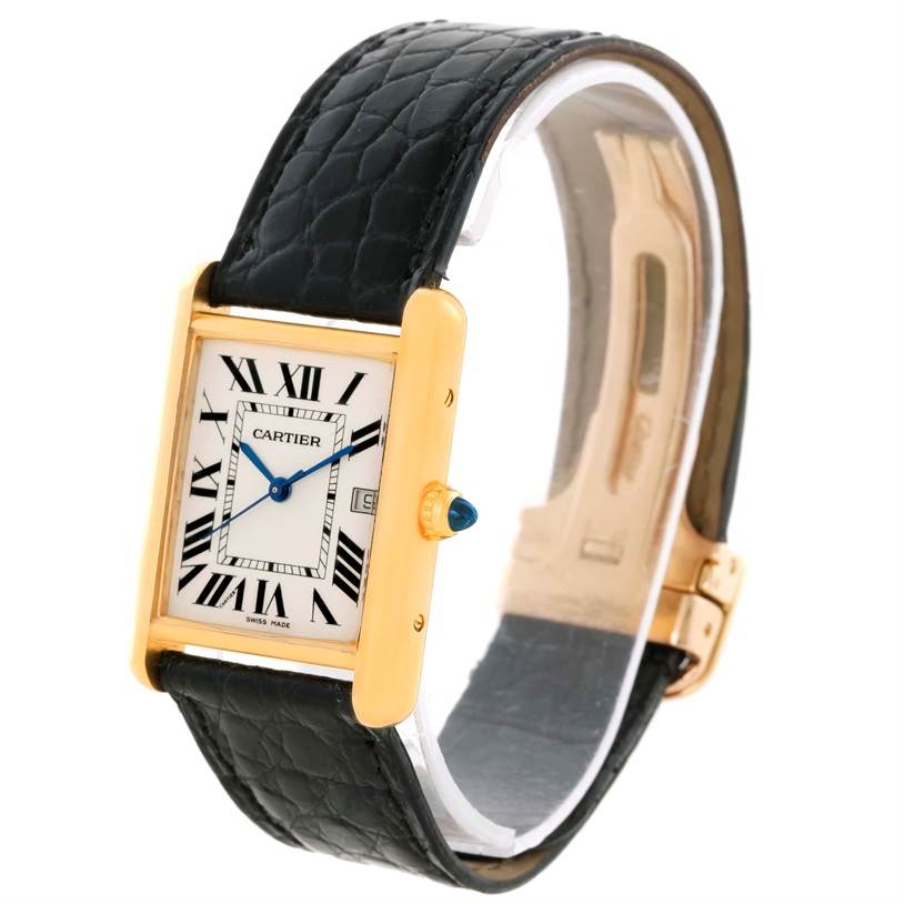 This image shows a Cartier Tank Louis W1529756 Men's Yellow Gold Silver Dial W1529756 Men's Yellow Gold Silver Dial watch at an angled view, highlighting the rectangular face, gold case, leather strap, and part of the buckle.