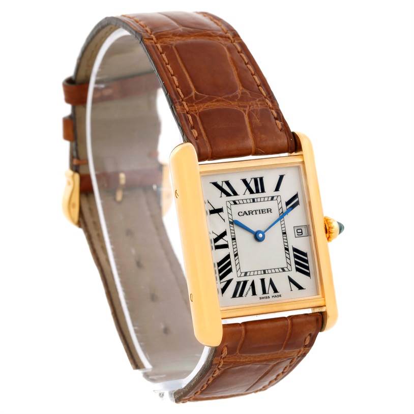 The Cartier Tank Louis Men's Yellow Gold Silver Dial Men's Yellow Gold Silver Dial watch model is shown from a high-angle view, displaying the face, case, and leather strap.