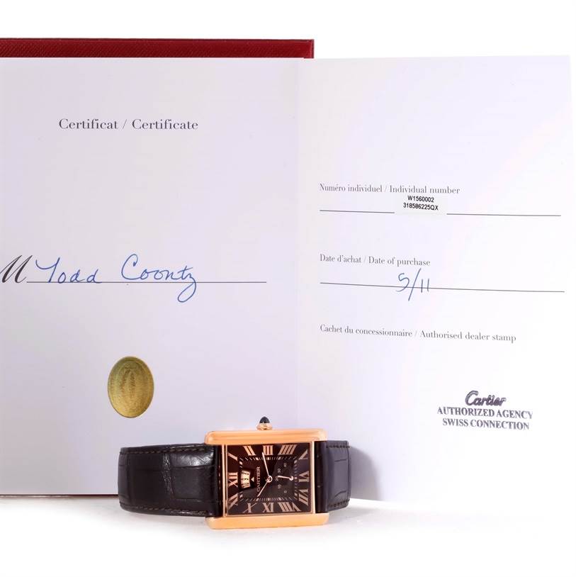 The image shows a Cartier Tank Louis W1560002 Men
s Rose Gold Brown Dial W1560002 Men
s Rose Gold Brown Dial watch with a brown leather strap, accompanied by its certificate of Best Quality
ity.