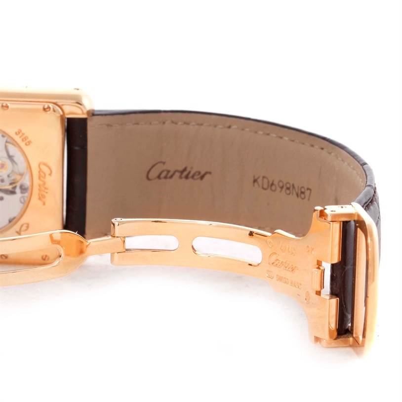 This image shows the clasp, strap, and part of the back of a Cartier Tank Louis W1560002 Men
s Rose Gold Brown Dial W1560002 Men
s Rose Gold Brown Dial watch.
