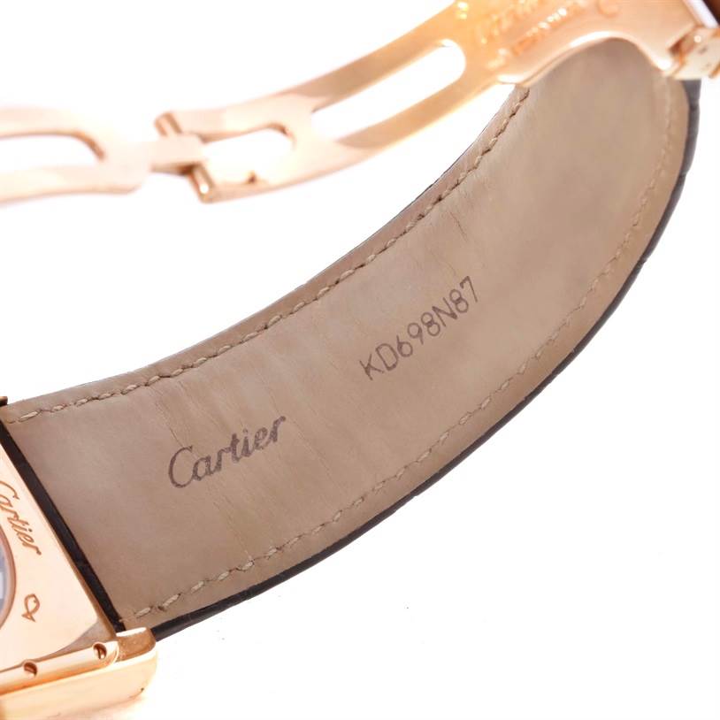 This image shows a close-up of the underside of the leather strap and clasp of a Cartier Tank Louis W1560002 Men
s Rose Gold Brown Dial W1560002 Men
s Rose Gold Brown Dial watch.