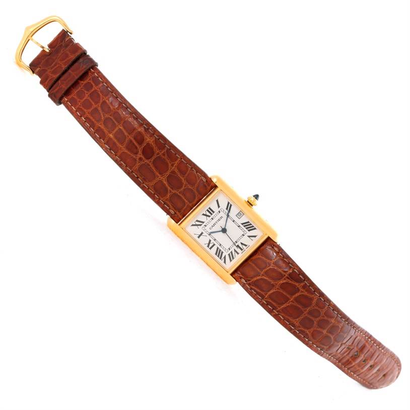 The image shows a top-down view of a Cartier Tank Louis W1529756 Men's Yellow Gold Silver Dial W1529756 Men's Yellow Gold Silver Dial watch with a brown leather strap.