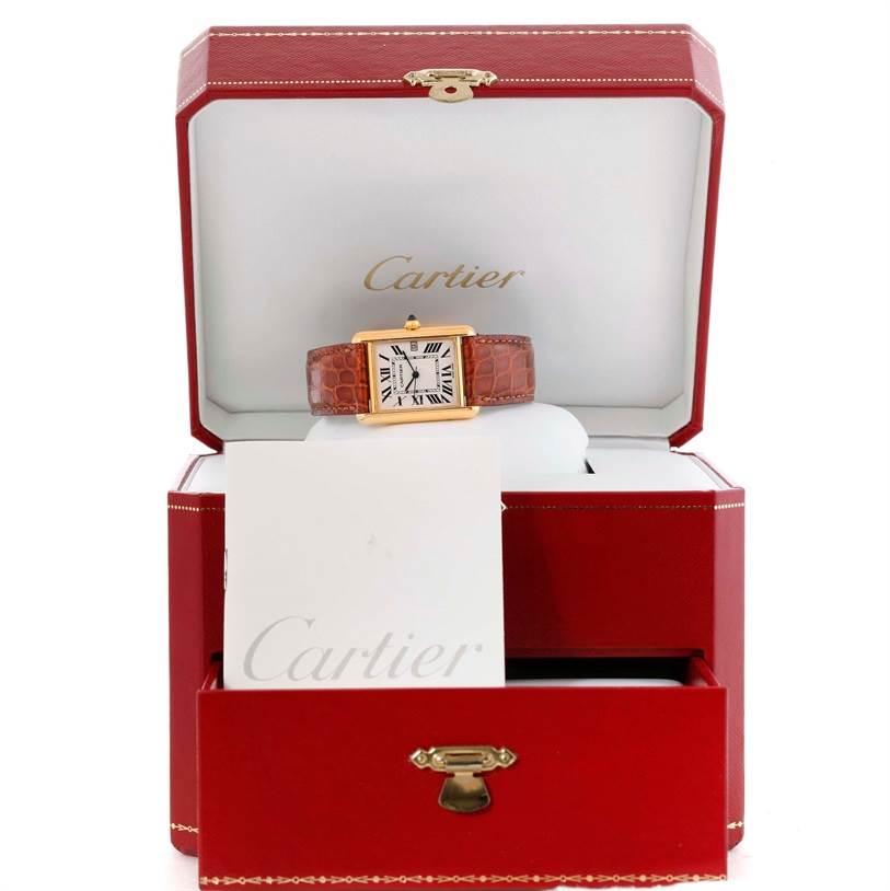 The Cartier Tank Louis W1529756 Men's Yellow Gold Silver Dial W1529756 Men's Yellow Gold Silver Dial watch is displayed front-facing in a red Cartier box with visible branding.